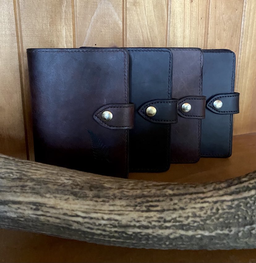 From left to right: whisky with silver fern laser engraved, havana NZ leather, whisky, havana NZ leather.