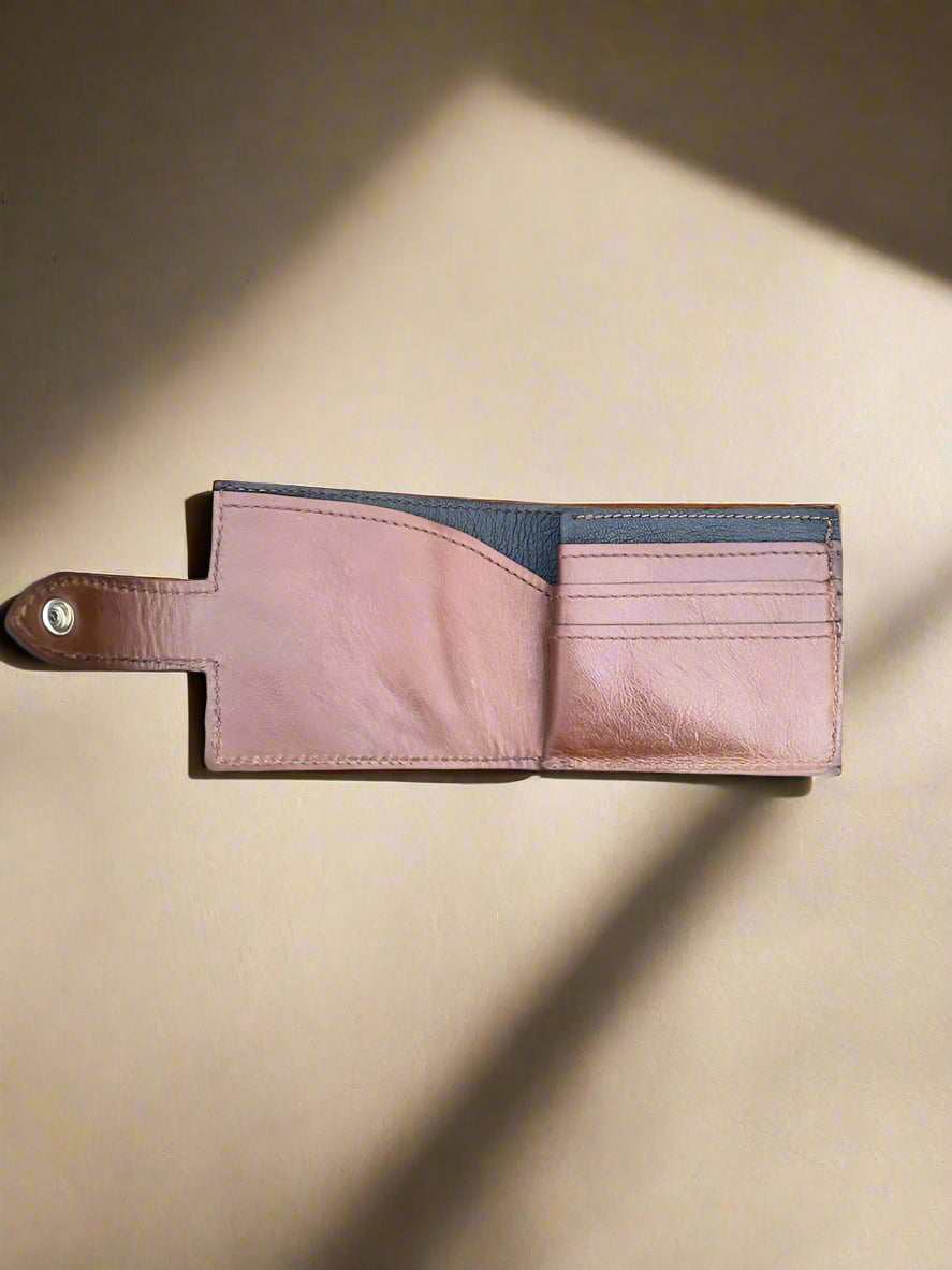 Tan NZ leather inside.