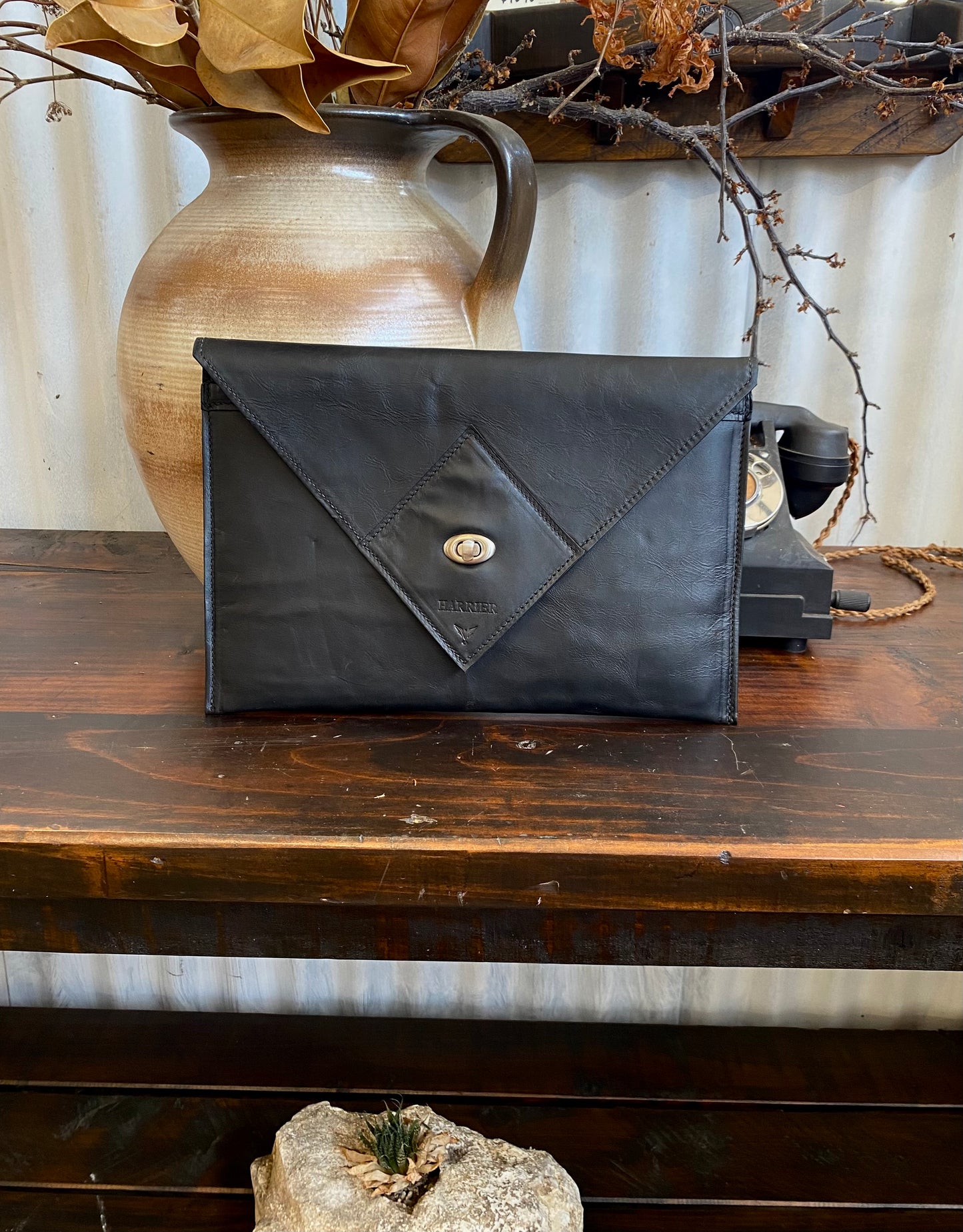 Havana NZ leather Laptop case with silver closure.