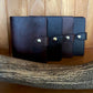 From left to right: whisky with silver fern laser engraved, havana NZ leather, whisky, havana NZ leather. 