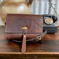 Whisky brown with gold hardware 