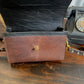 Whisky brown with gold hardware