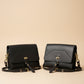 Havana NZ leather Shoulder Bag with silver and gold hardware, front view. 