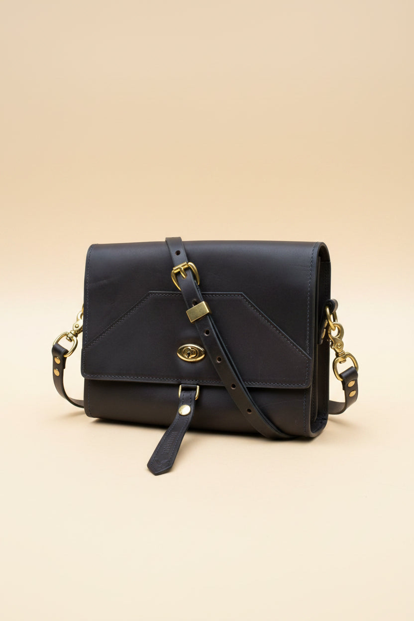 Havana NZ leather shoulder bag with gold hardware. Front view. 