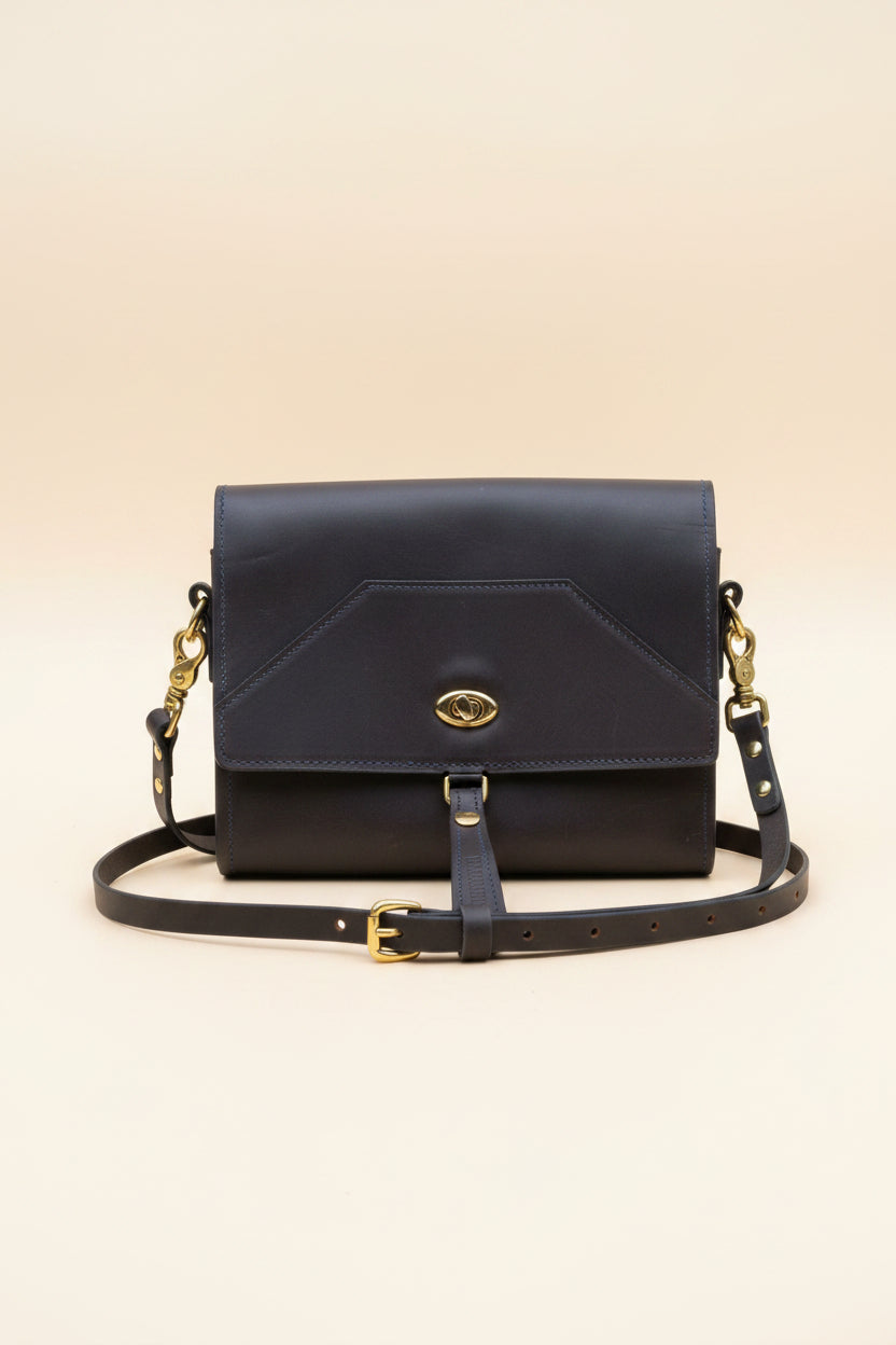 Havana NZ leather shoulder bag with gold hardware, front view.