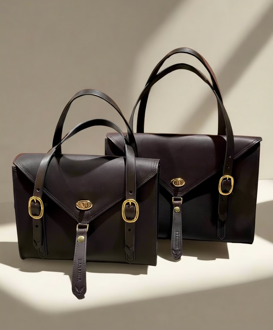 Fisher Purse and Carrow Purse both in Havana leather with gold hardware. 