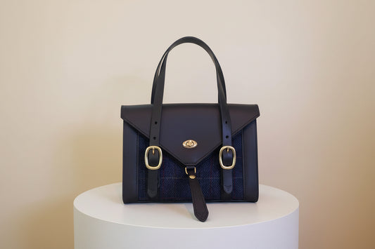 Havana Fisher Purse with navy harris tweed panels and gold hardware. 