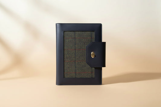 Havana NZ leather compendium with forest harris tweed panels and gold hardware. 