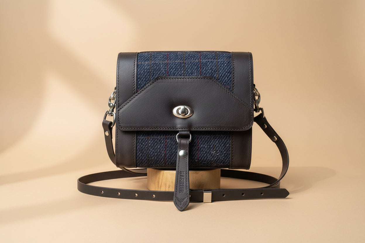 Helm Bag made out of Havana NZ Leather and Navy Harris Tweed. 