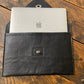 Havana NZ leather laptop case with silver closure.