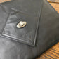 Havana NZ leather laptop case with silver closure.