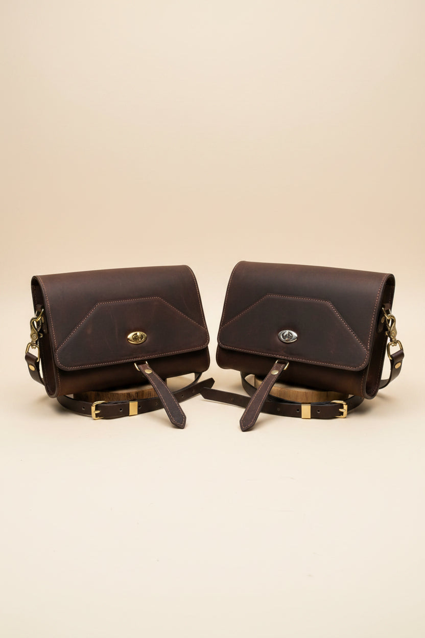 Walnut NZ leather Alder shoulder bag with silver and brass hardware, front view. 