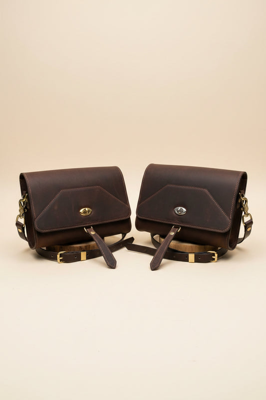 Walnut NZ leather Alder shoulder bag with silver and brass hardware, front view. 