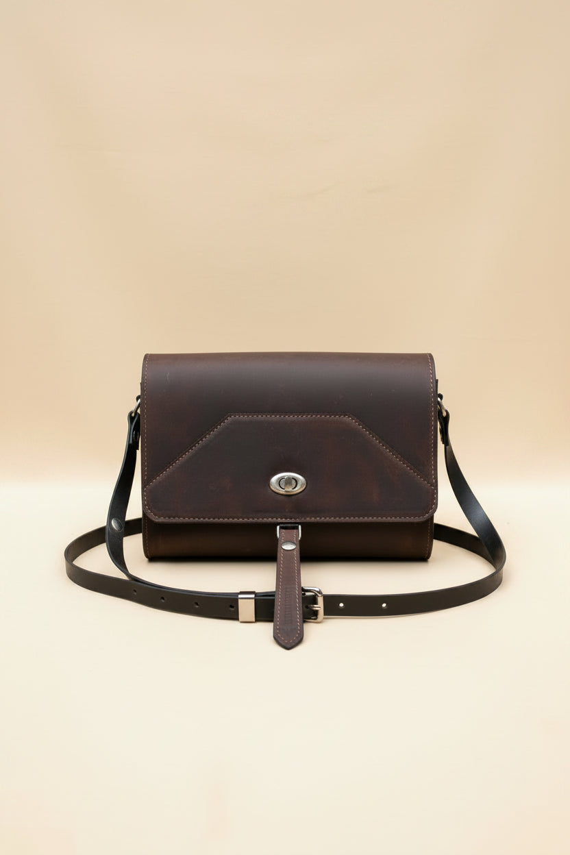 Walnut NZ leather Shoulder Bag with silver hardware, front view. 