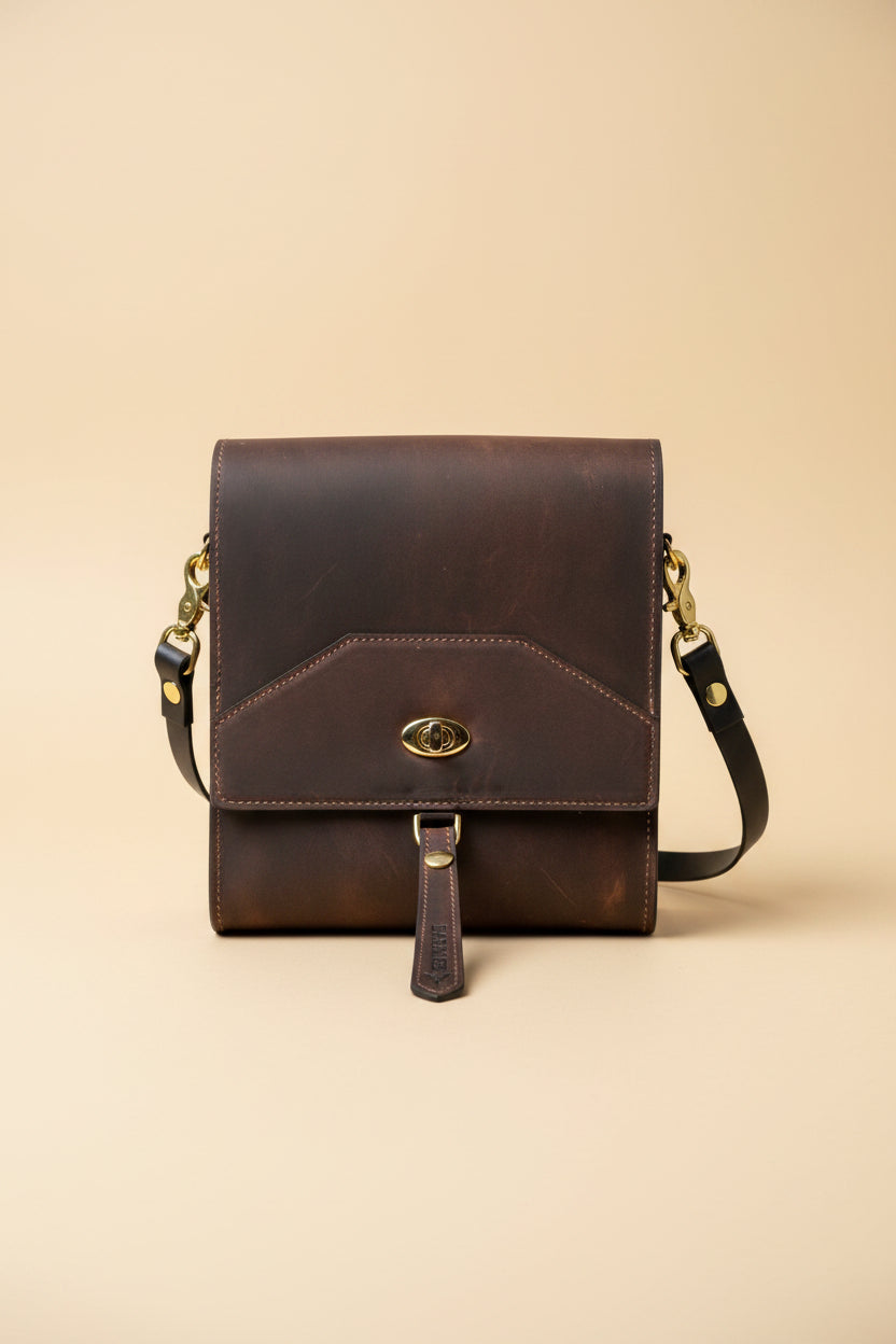 Walnut NZ leather Duchess Day tripper with gold hardware. 